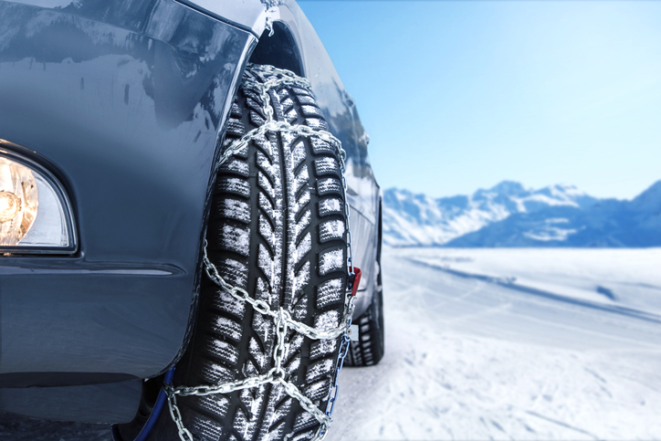 Car with mounted snow chains